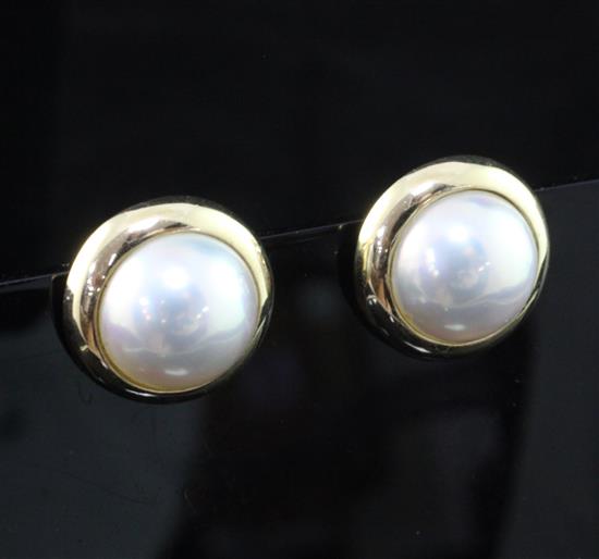 A pair of Tiffany & Co 14ct gold and mabe pearl ear clips, approx. 0.75in.